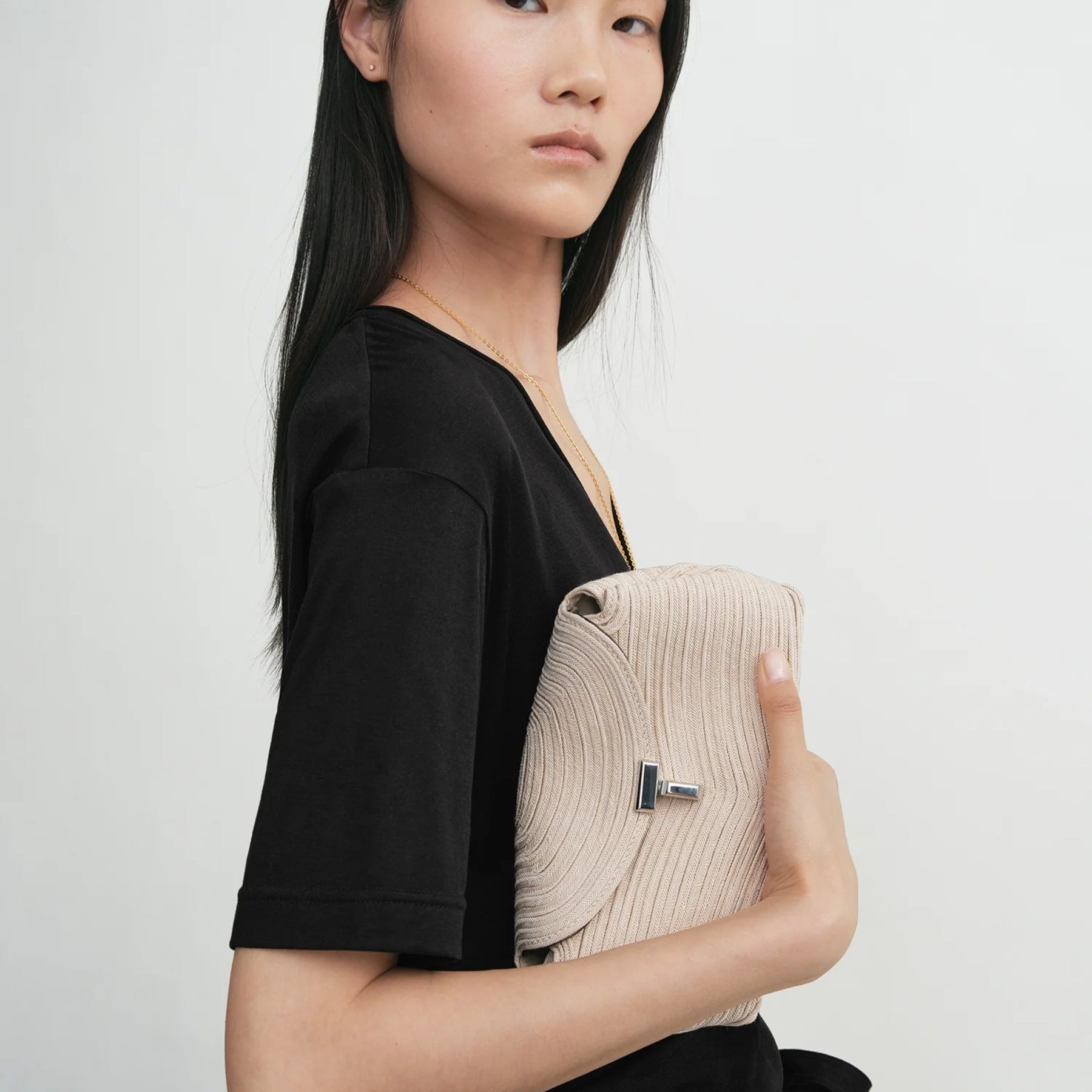 Toteme Mini T-Lock clutch pearl