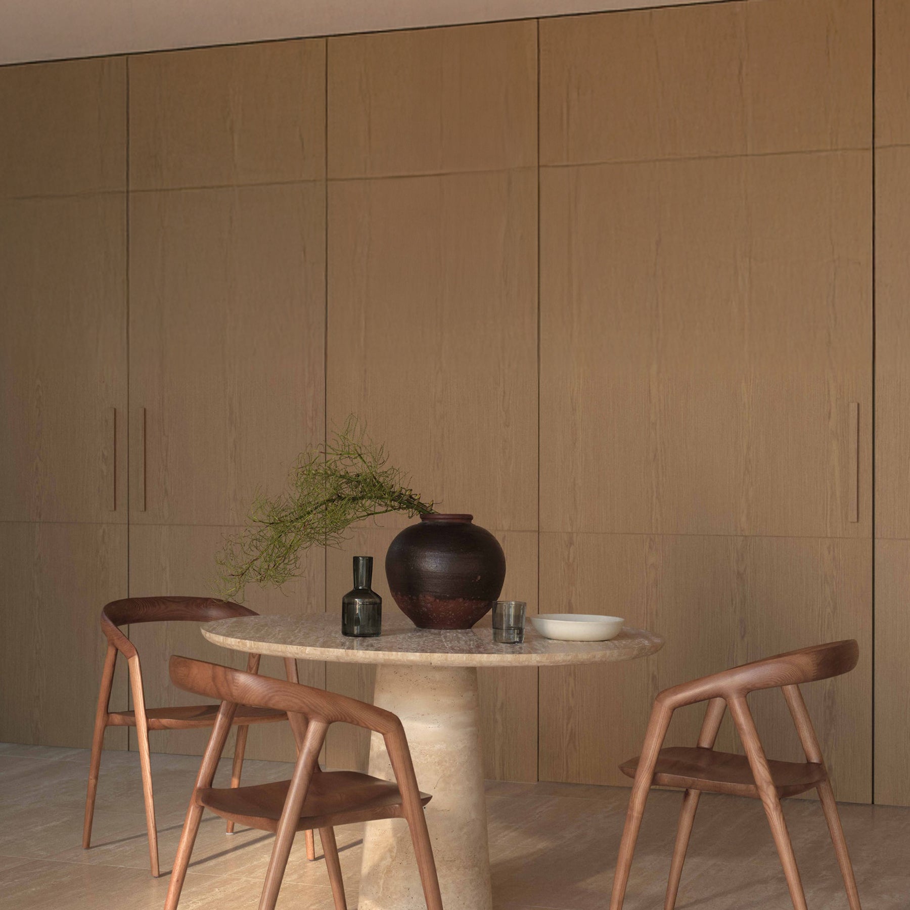 MCM House | Kora Round Dining Table in Natural Travertine Stone | The UNDONE