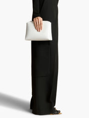 KHAITE Lina Pochette in Cream