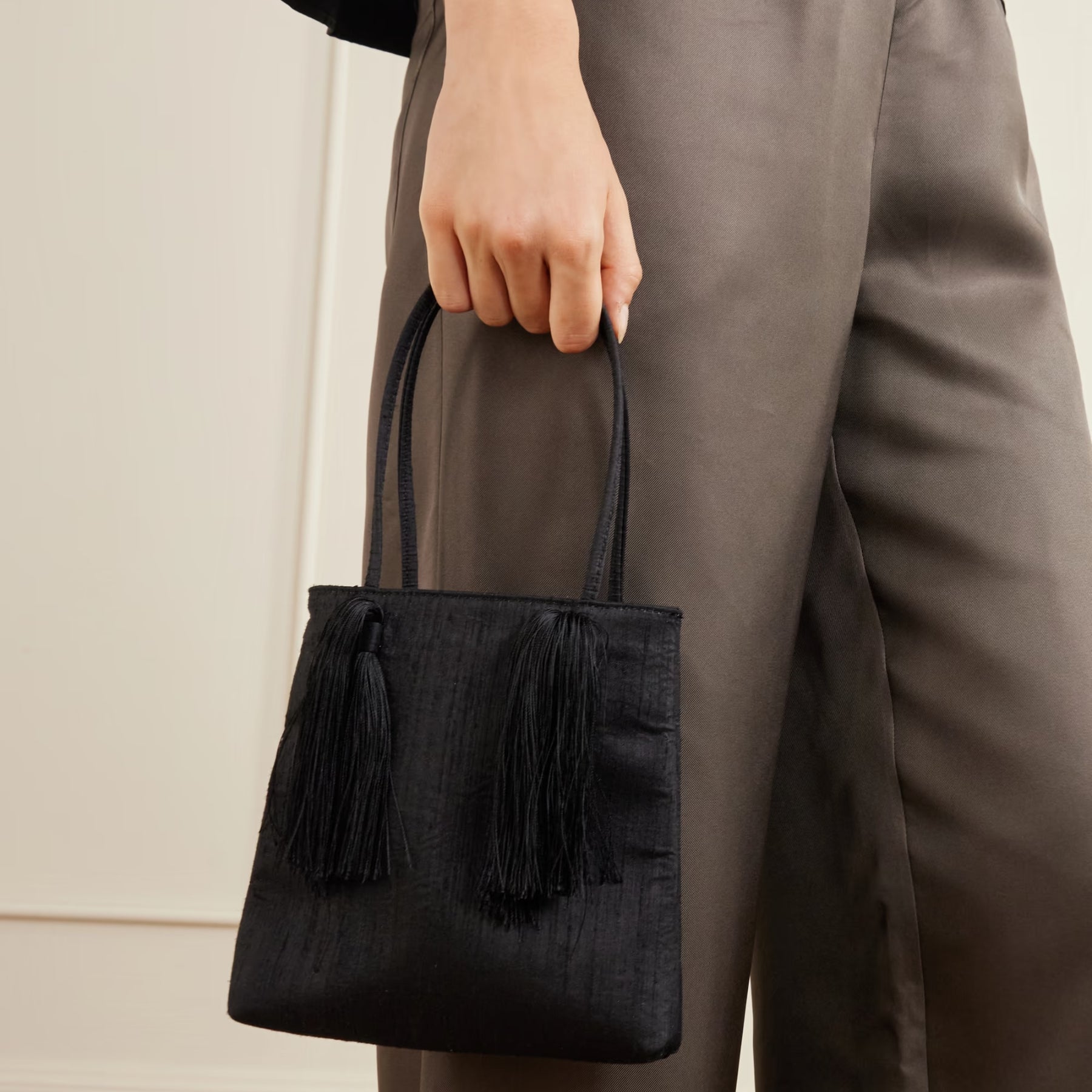 Le Sundial | Le Salon black tasseled dupioni clutch