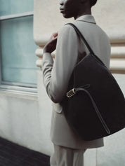 Liffner | Belted Bucket Bag Large in Black Suede | The UNDONE