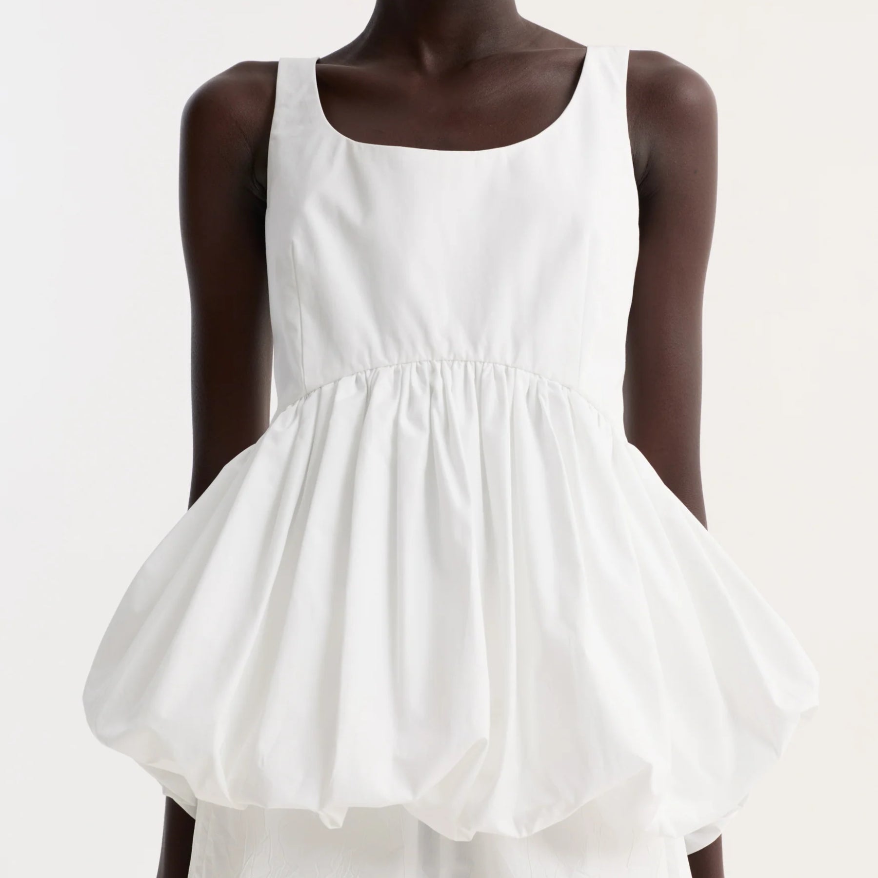 Rohe_voluminouspeplumtop_white_model.jpg