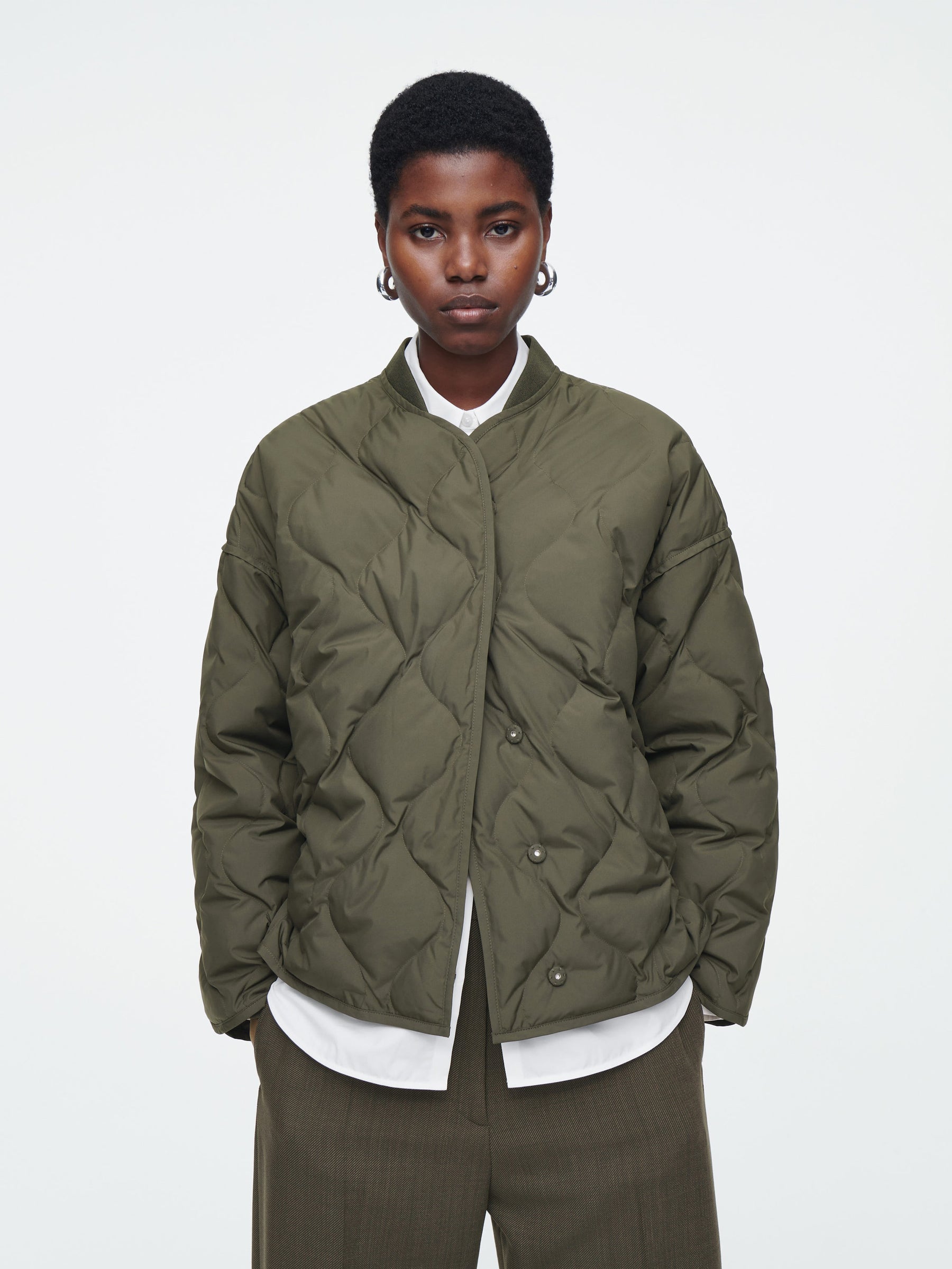 COS | Oversized Quilted Jacket in Dark Khaki | The UNDONE