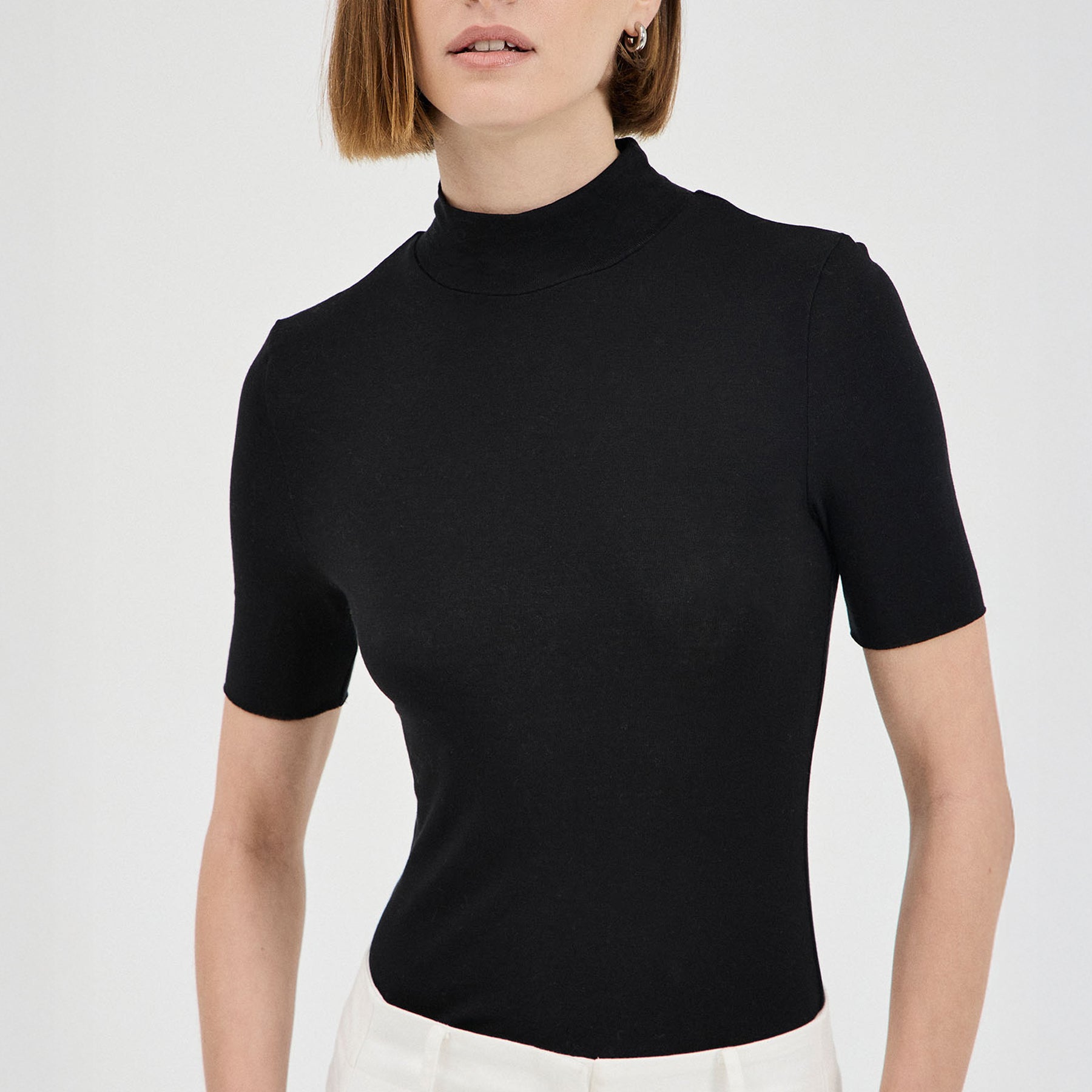 FRIEND OF AUDREY | The Tencel Wool Short Sleeve Top in Black | The UNDONE