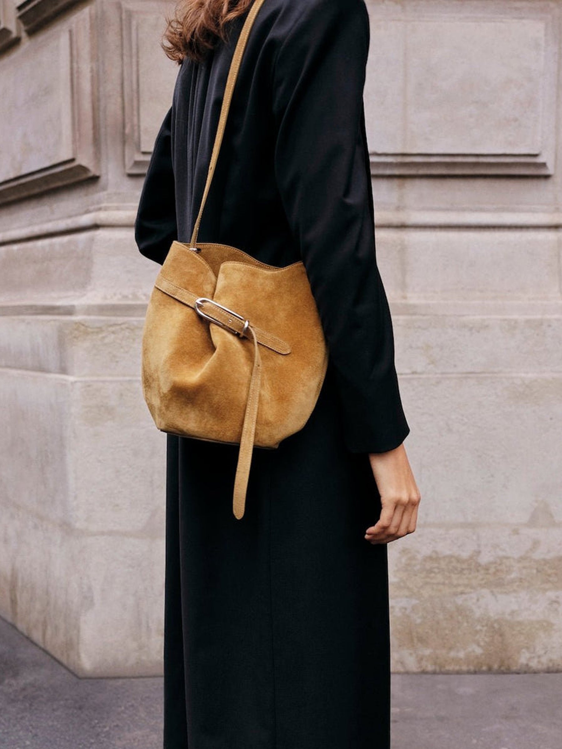 Liffner | Belted Bucket Bag in Beige Suede | The UNDONE