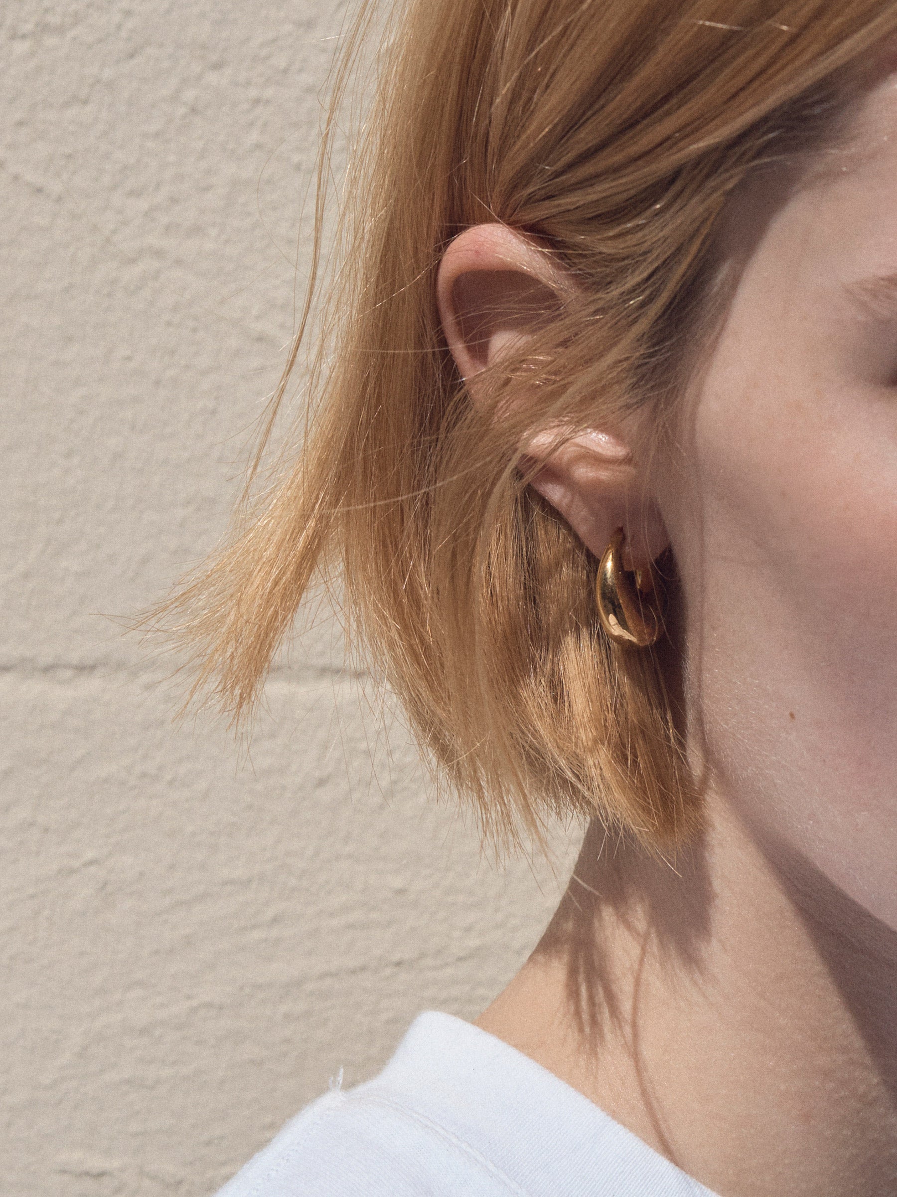 Rylan | Smooth Moon Hoop Earrings in Gold | The UNDONE