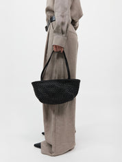 St. Agni | Petit Woven Trapeze Bag in Black | The UNDONE