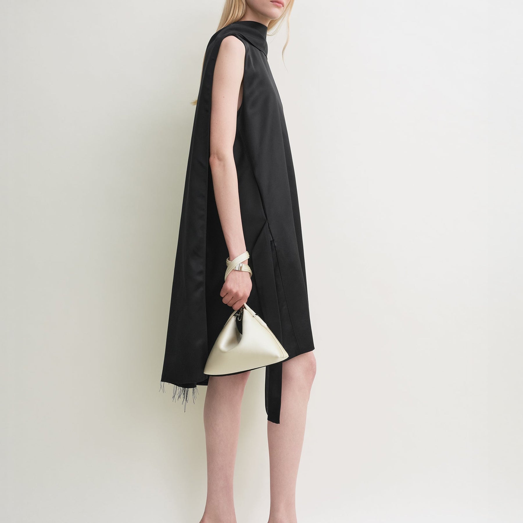 TOTEME | Bevel Satin Wristlet in White Ecru | The UNDONE