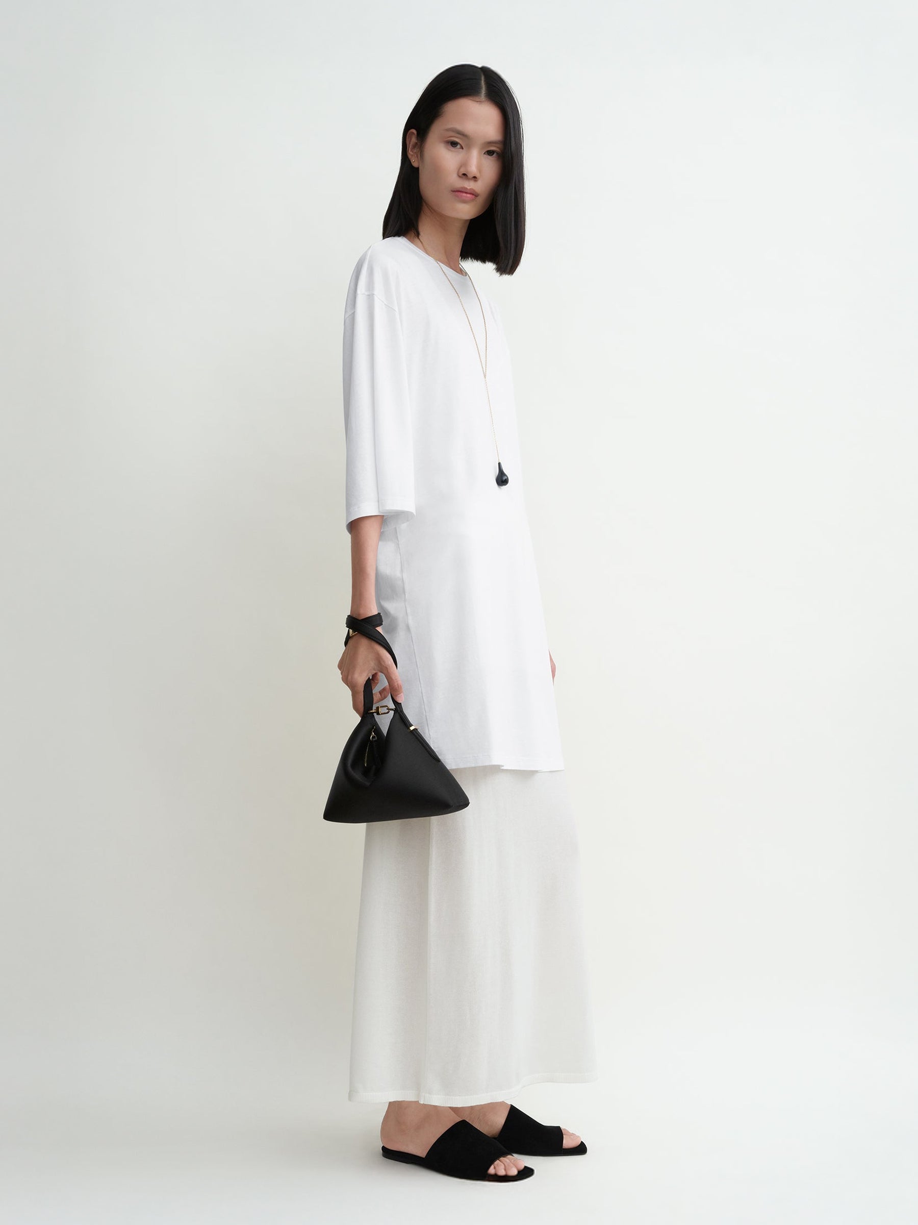TOTEME | Bevel Satin Wristlet in Black | The UNDONE
