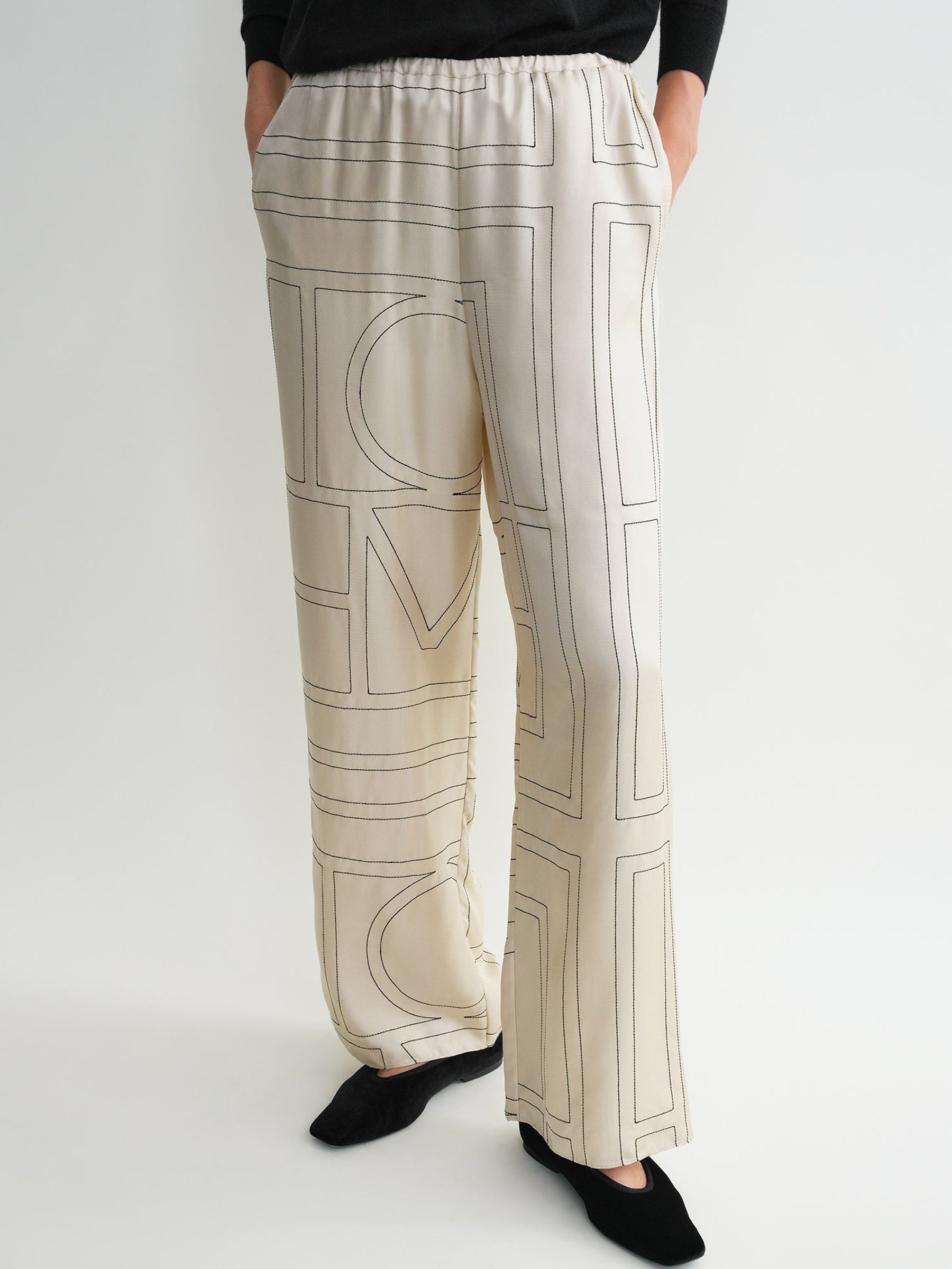 TOTEME | Monogram Silk PJ Bottoms in Ivory | The UNDONE