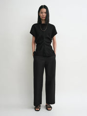 TOTEME | Slouch Waist Basketweave Top in Black | The UNDONE