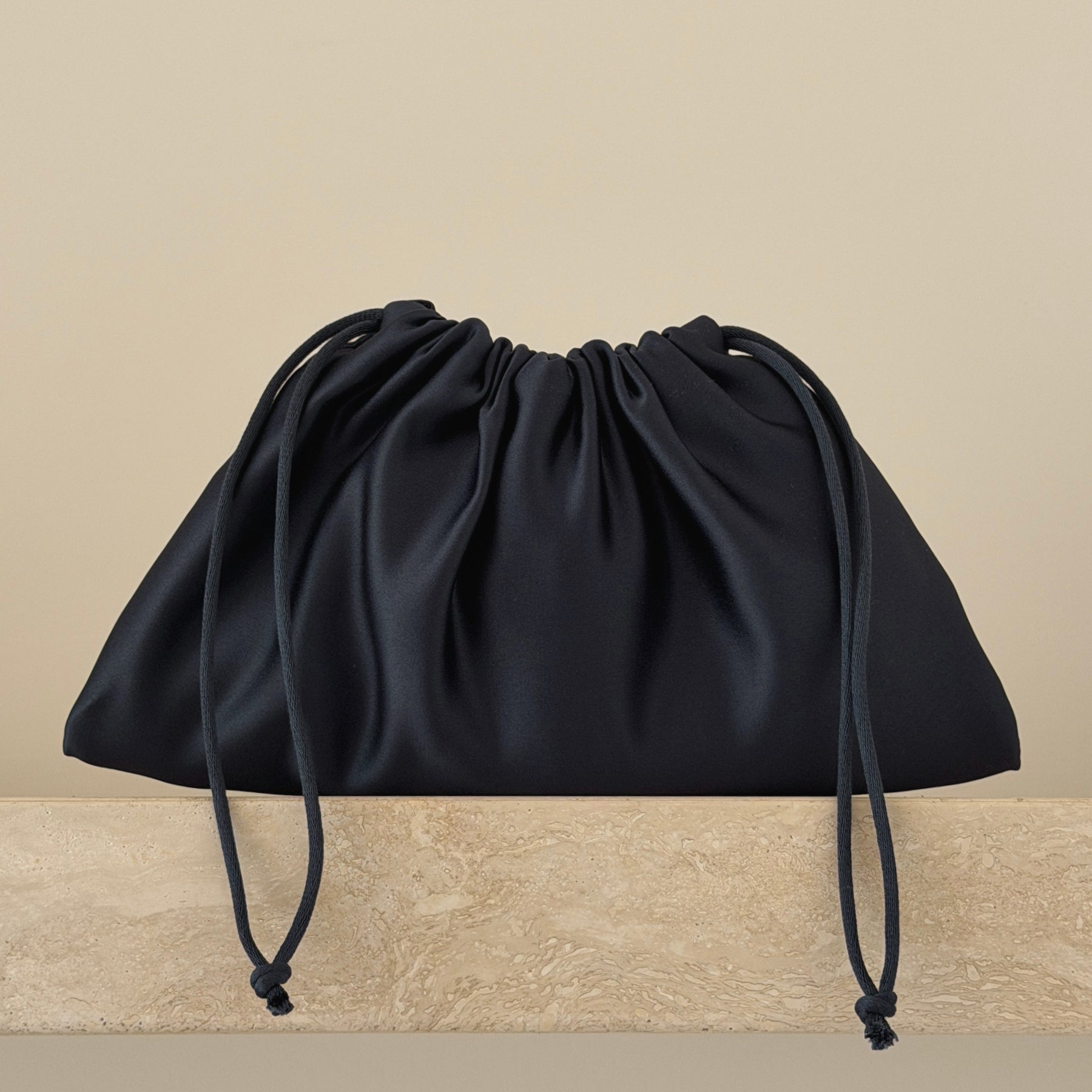 The Navy Satin Pouch Bag | The UNDONE