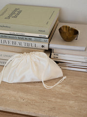 The Essential Satin Pouch Bag in Ivory | The UNDONE