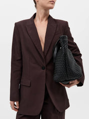St. Agni | Large Woven Trapeze Bag in Black | The UNDONE