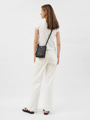 St. Agni | Woven Boxy Sling Pouch in Black | The UNDONE