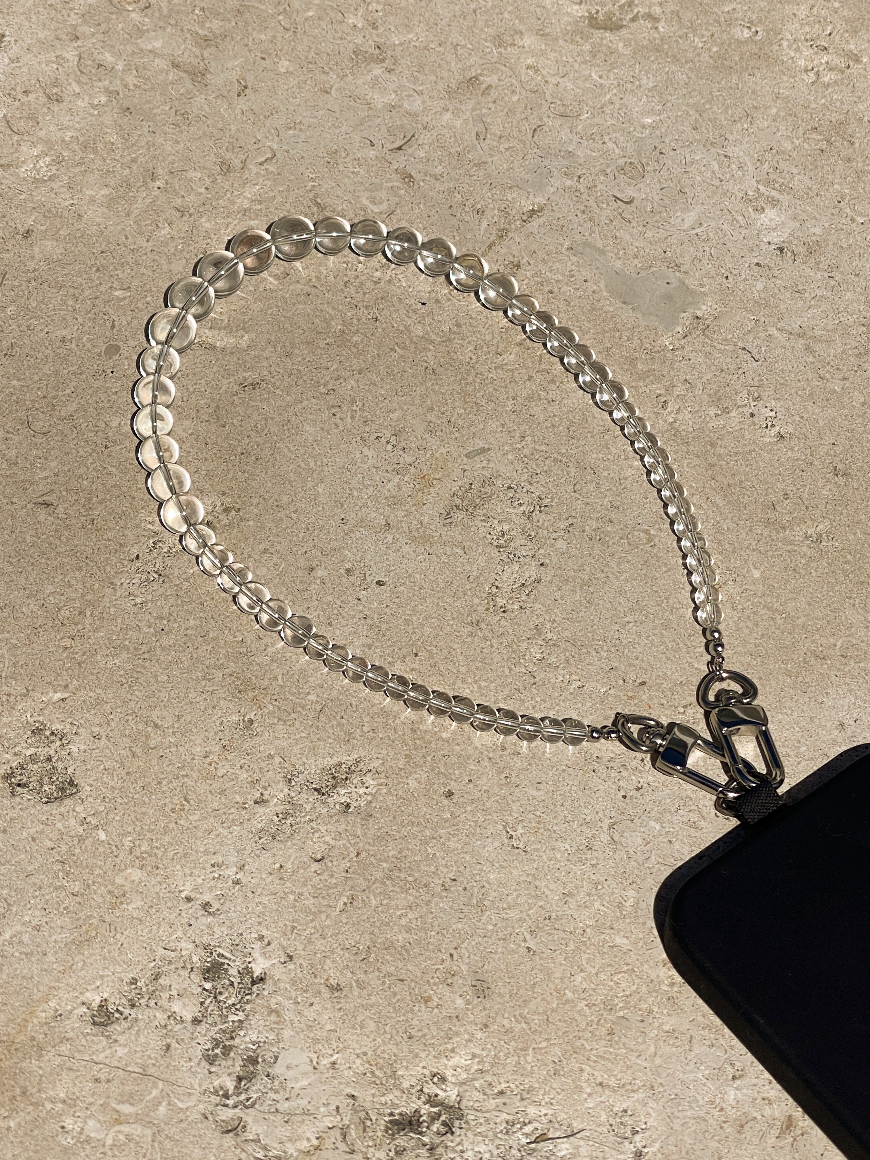 TheUNDONE_clear_glass_phone_chain.jpg