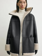 TOTEME | Signature shearling jacket black/off-white | The UNDONE