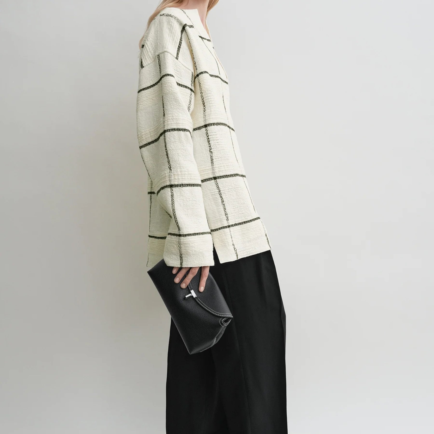 T-Lock grained-leather clutch in Black | Toteme