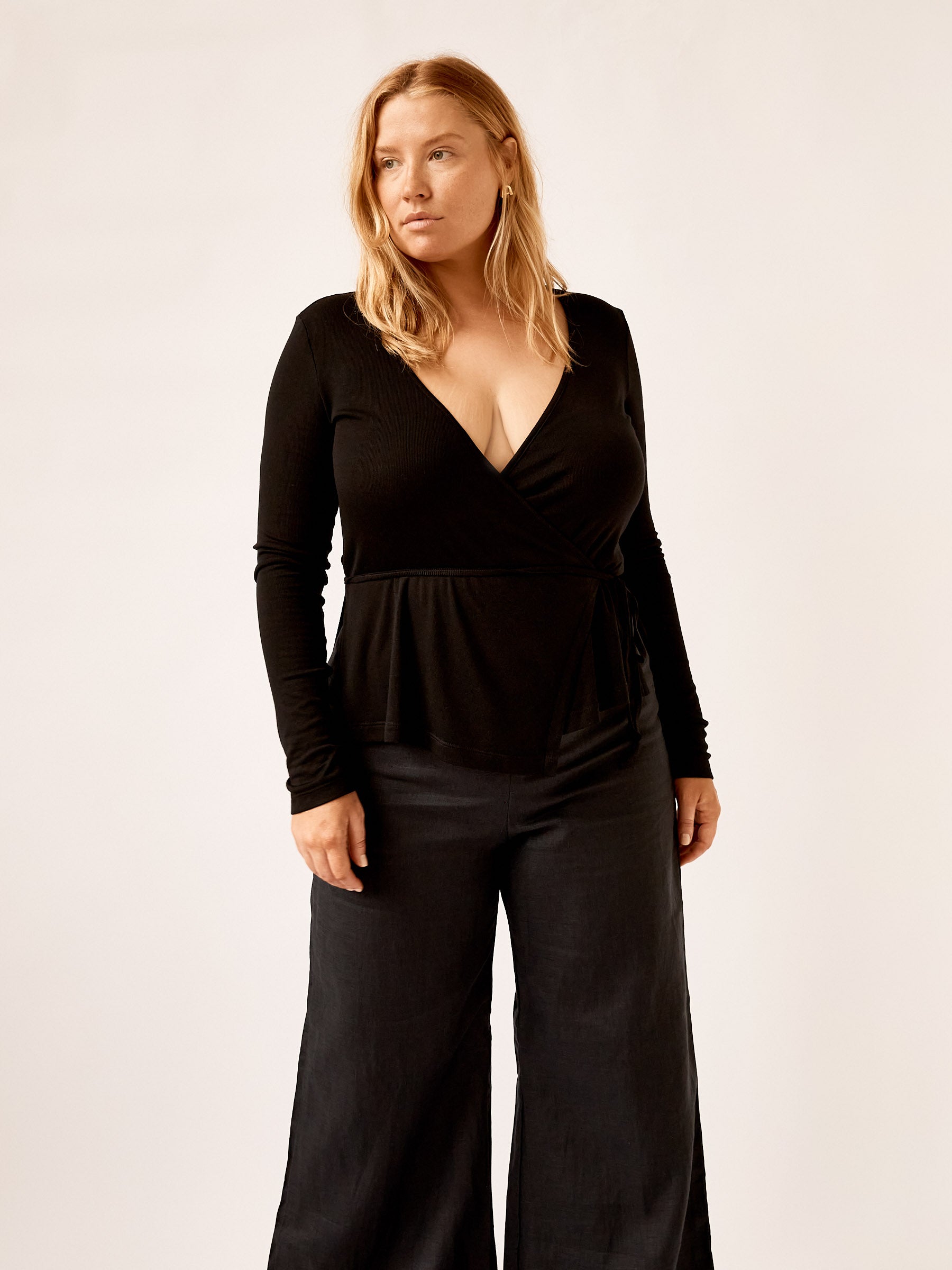 Arnsdorf | Misty Wrap Top in Black | The UNDONE