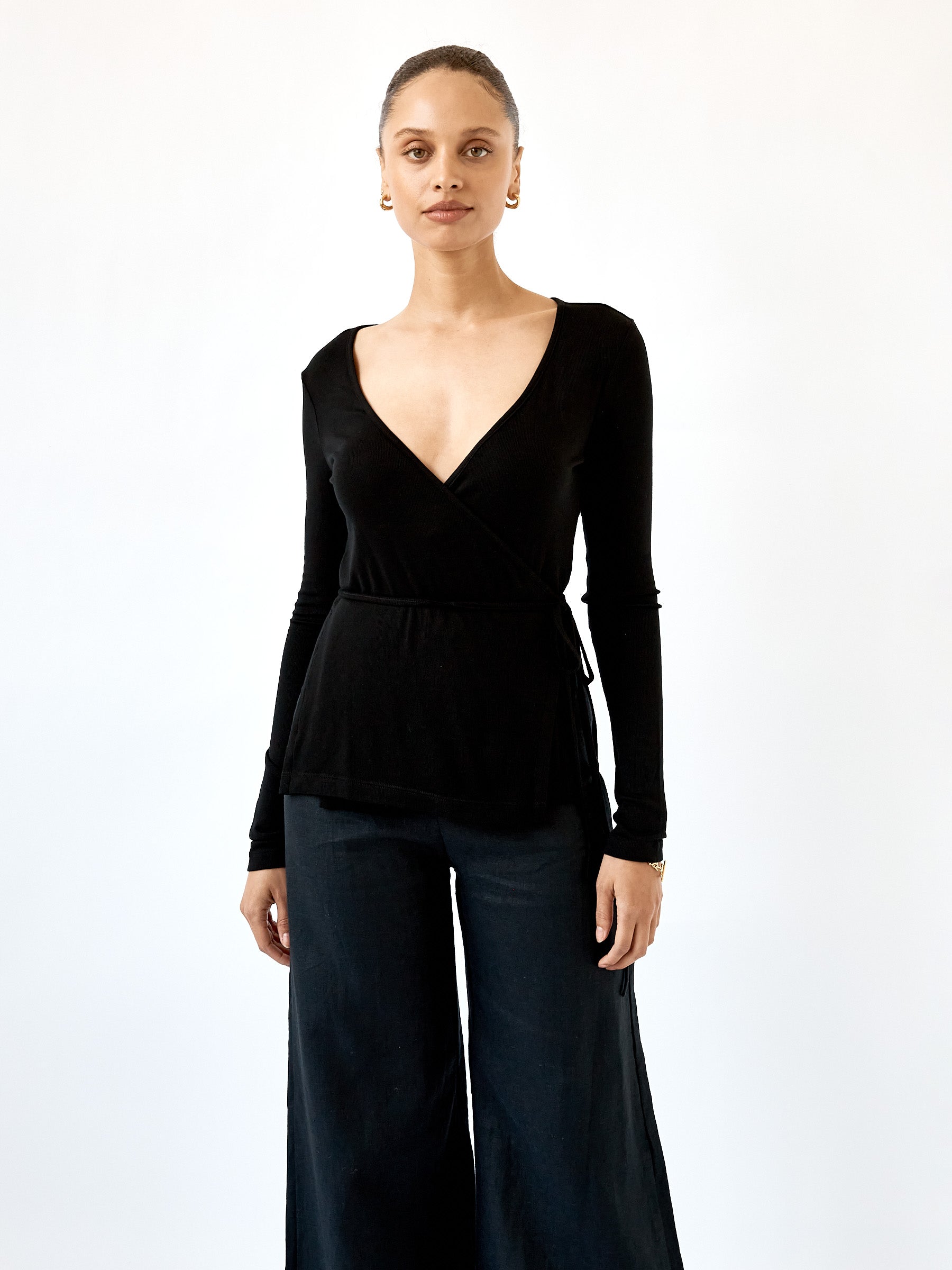 Arnsdorf | Misty Wrap Top in Black | The UNDONE