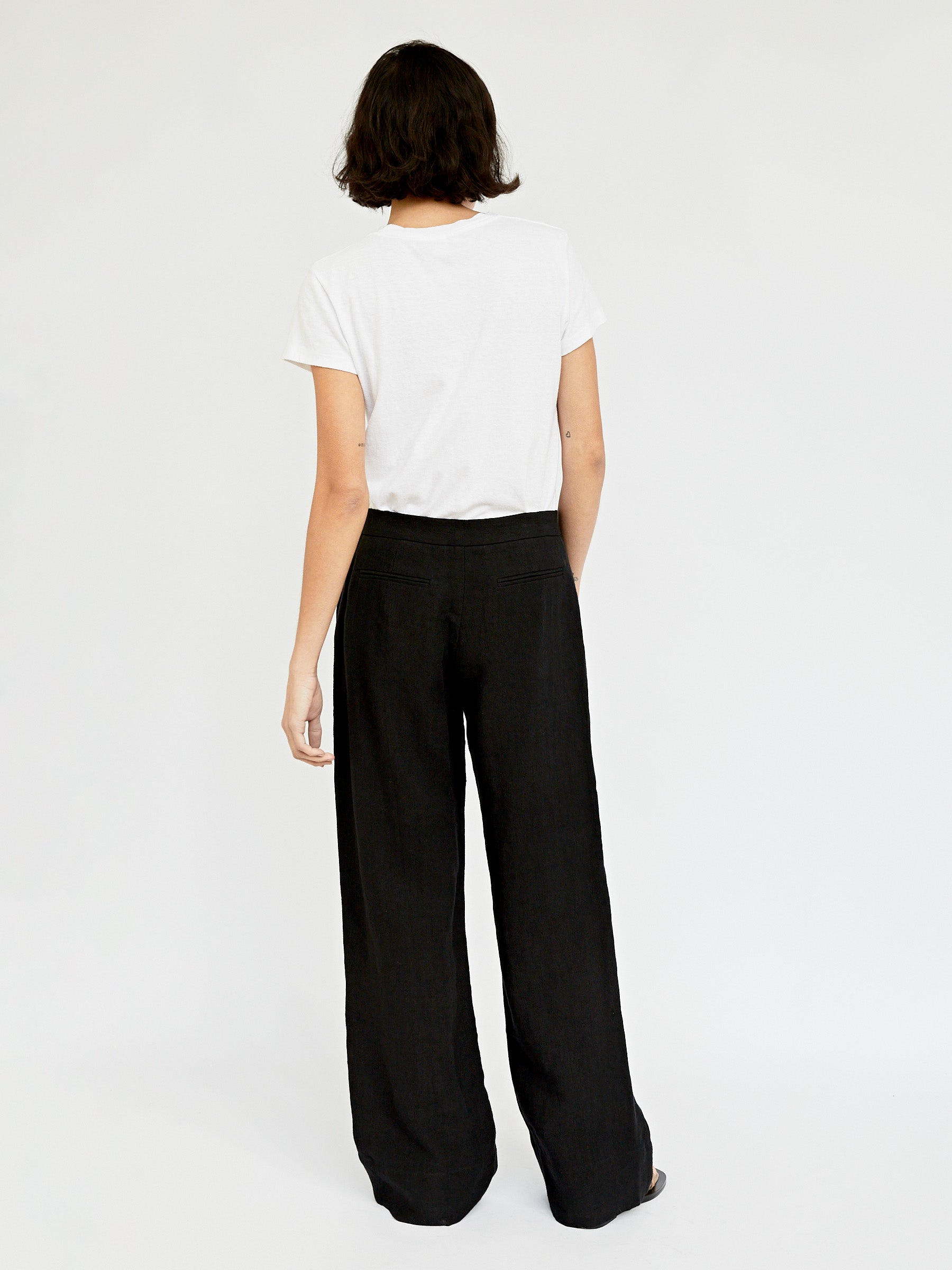 St. Agni | Linen Pleated Detailed Trousers in Black | The UNDONE