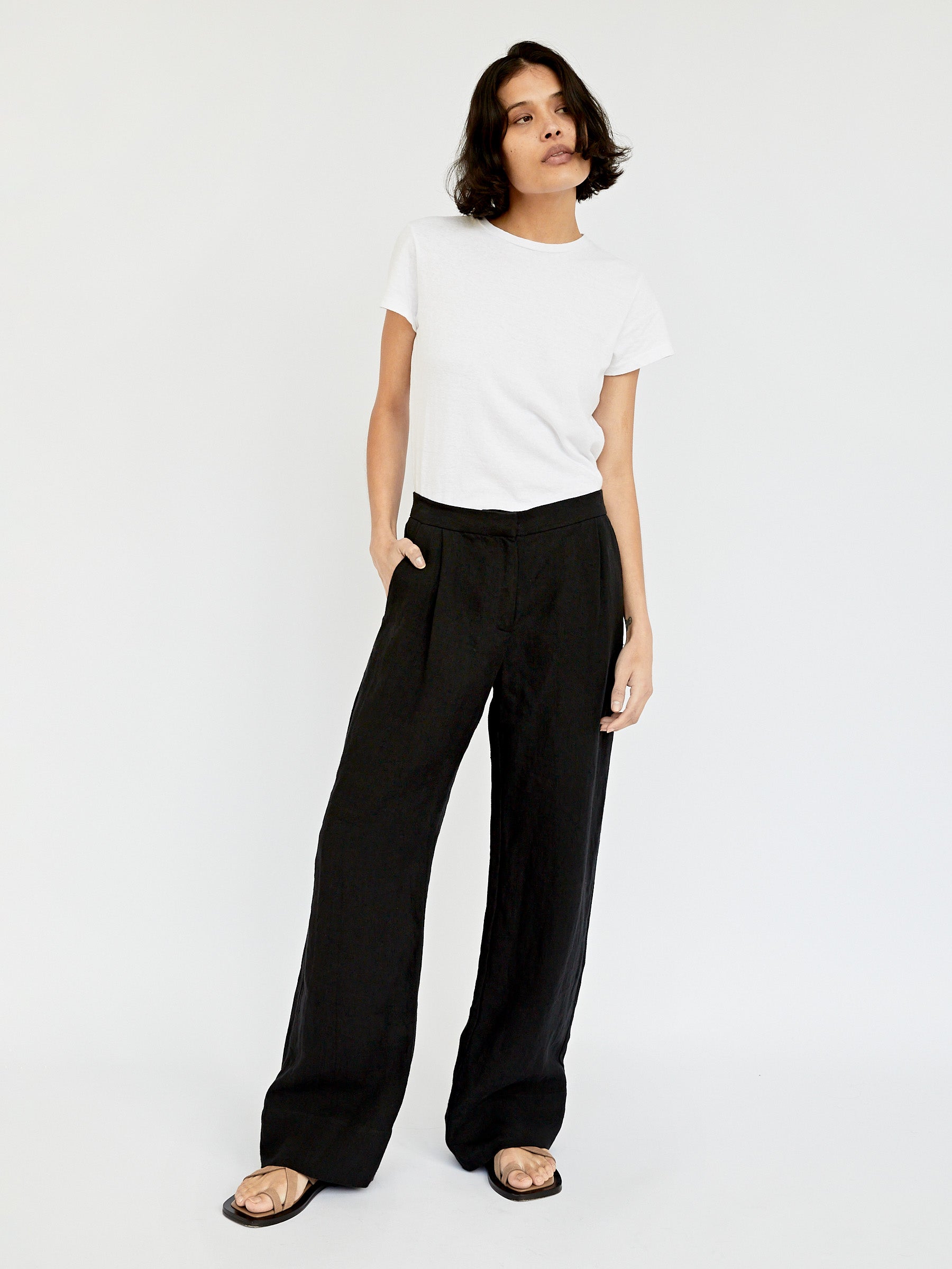 St. Agni | Linen Pleated Detailed Trousers in Black | The UNDONE