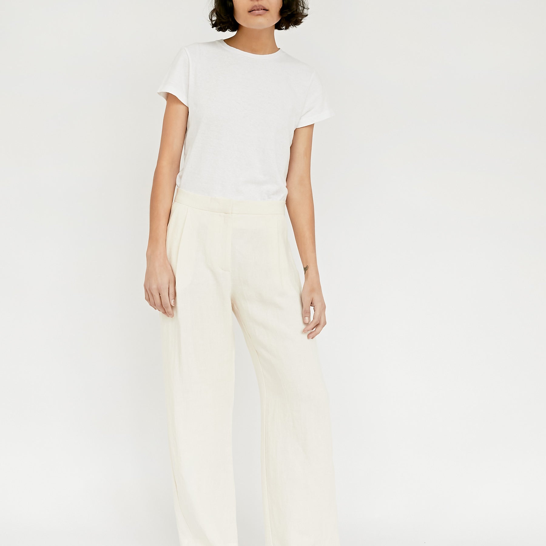 St. Agni | Linen Pleated Detailed Trousers in Ivory | The UNDONE
